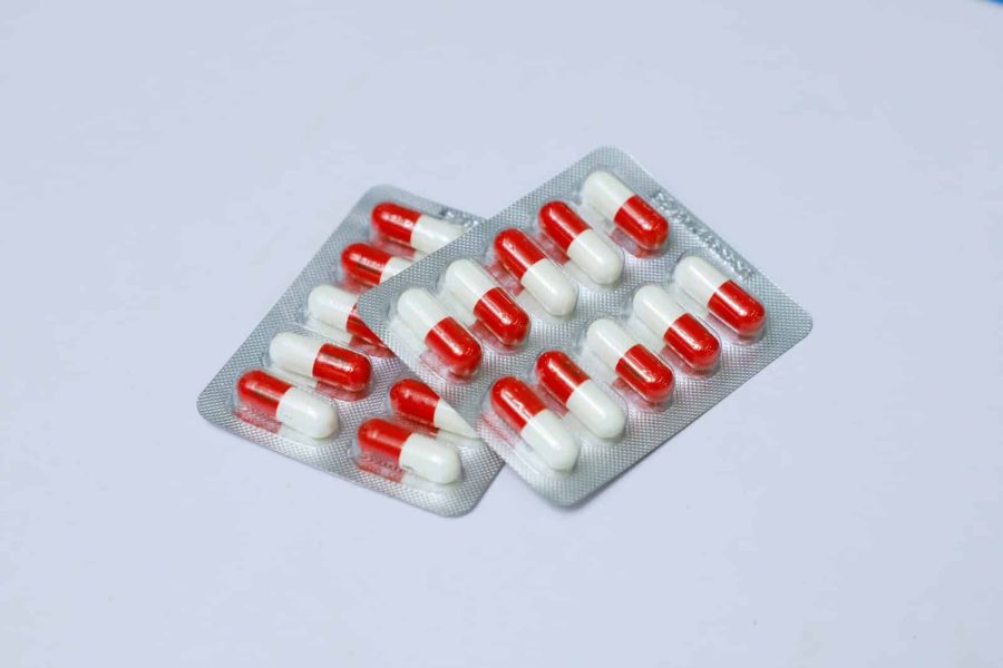 red and white medication pill blister pack